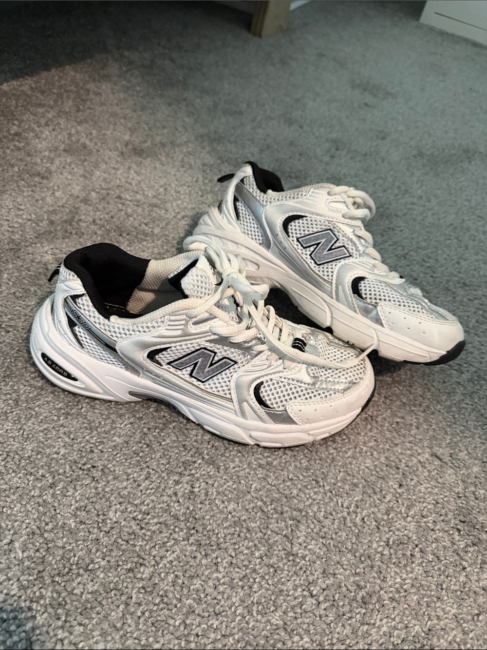 New Balance Women's White and Black Mesh Athletic Sneakers